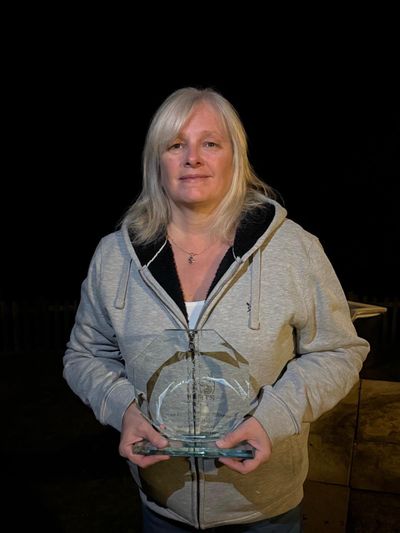 Clare Holt holding the Jo Eames Award
